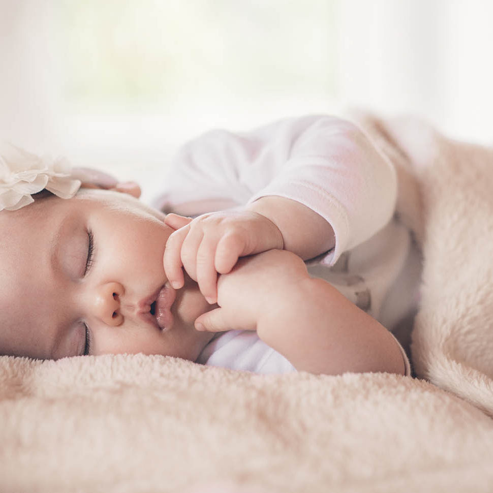 Close-up portrait of a beautiful sleeping baby